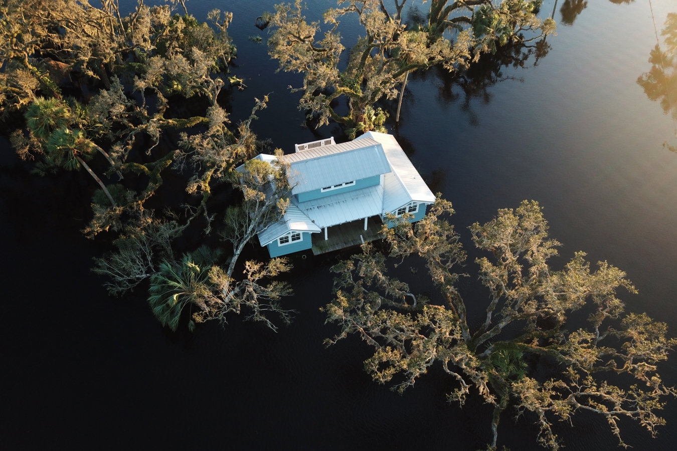 A home surrounded by flood waters
